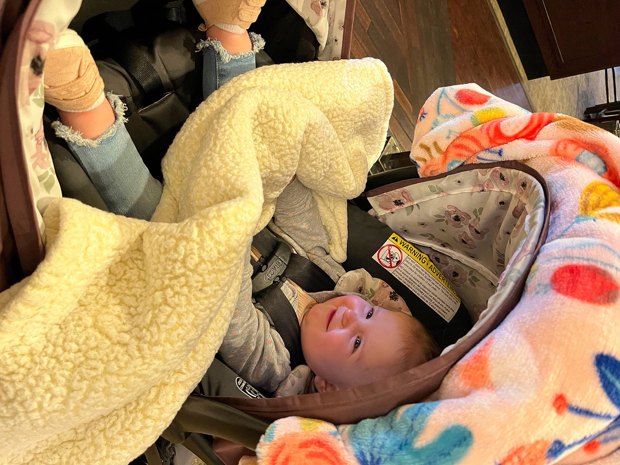 Kallie joined the competition — help win amazing prizes! auto_part, baby_products, car_seat, child, comfort, fun, gesture, human_leg, lap, leg, linens, luxury_vehicle, nap, passenger, person, room, sitting, sleep, steering_wheel, tree