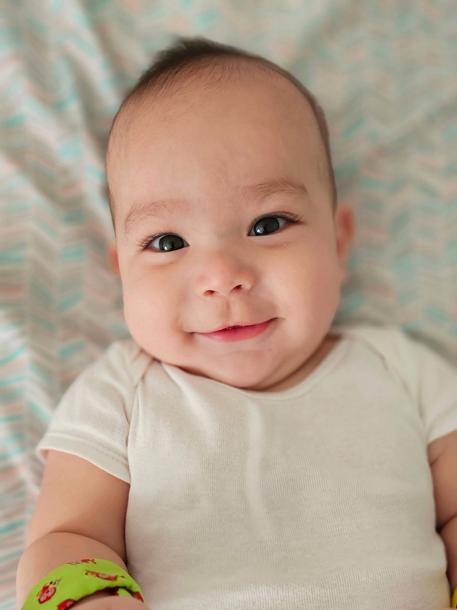 Gabriel joined the competition — help win amazing prizes! baby, baby_toddler_clothing, cheek, child, chin, collar, eye, eyelash, facial_expression, happy, iris, lip, nose, pattern, person, portrait_photography, sitting, skin, sleeve, smile