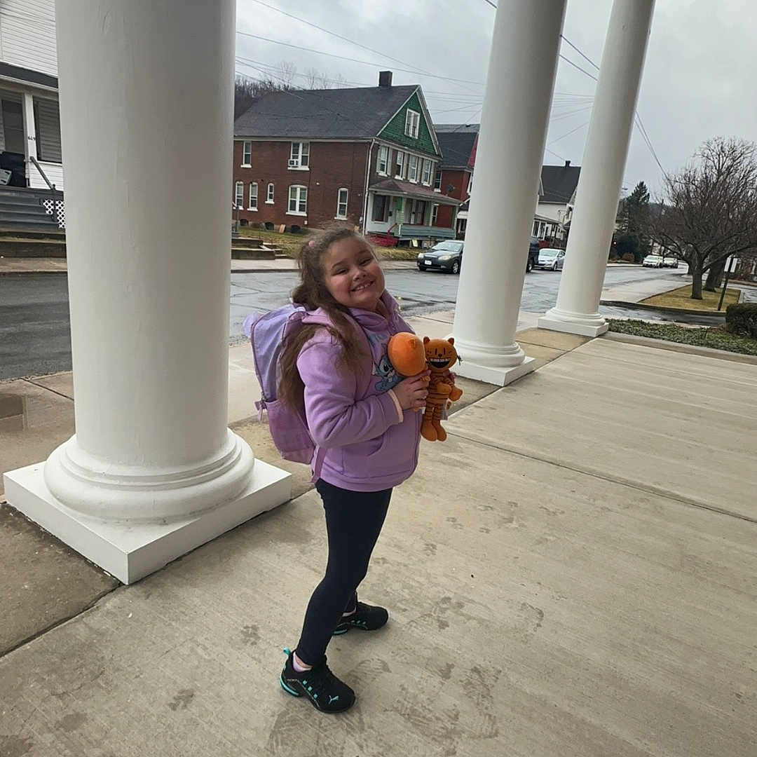 Lae'Ana joined the competition — help win amazing prizes! architecture, building, child, city, clothing, face, female, footwear, head, outdoors, pants, path, person, photography, portrait, road, shelter, shoe, street, urban