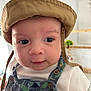 Harry a rejoint le concours — aidez-le/la à gagner de superbes lots ! baby, background, bucket_hat, child, close_up, clothing, colorful, cute, eyes, face, fashion, hat, indoor, infant, overalls, person, portrait, smile, soft_light, young_child