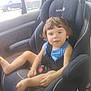 Braxton joined the competition — help win amazing prizes! toddler, child, car_seat, safety_seat, vehicle_interior, curly_hair, blue_shirt, barefoot, seatbelt, window, car, child_safety, young_child, portrait, baby, seat, child_in_car, interior, person, cute
