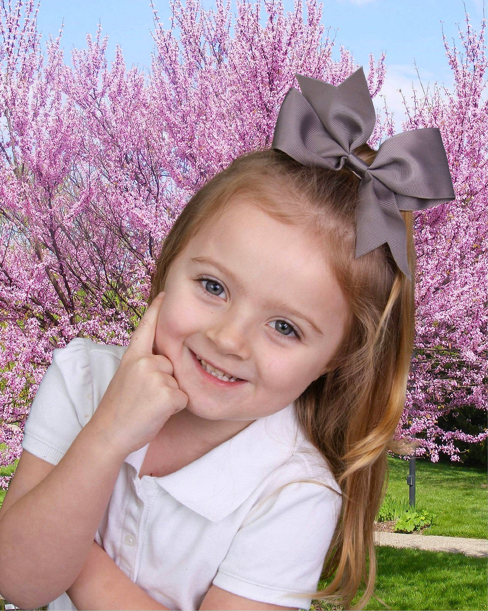 Leigha is registered to the contest to win money with this photo: blossom, cherry_blossom, child, ear, flower, grass, hair_accessory, hairstyle, headgear, iris, joy, lavender, lilac, person, photography, pink, plant, purple, skin, smile
