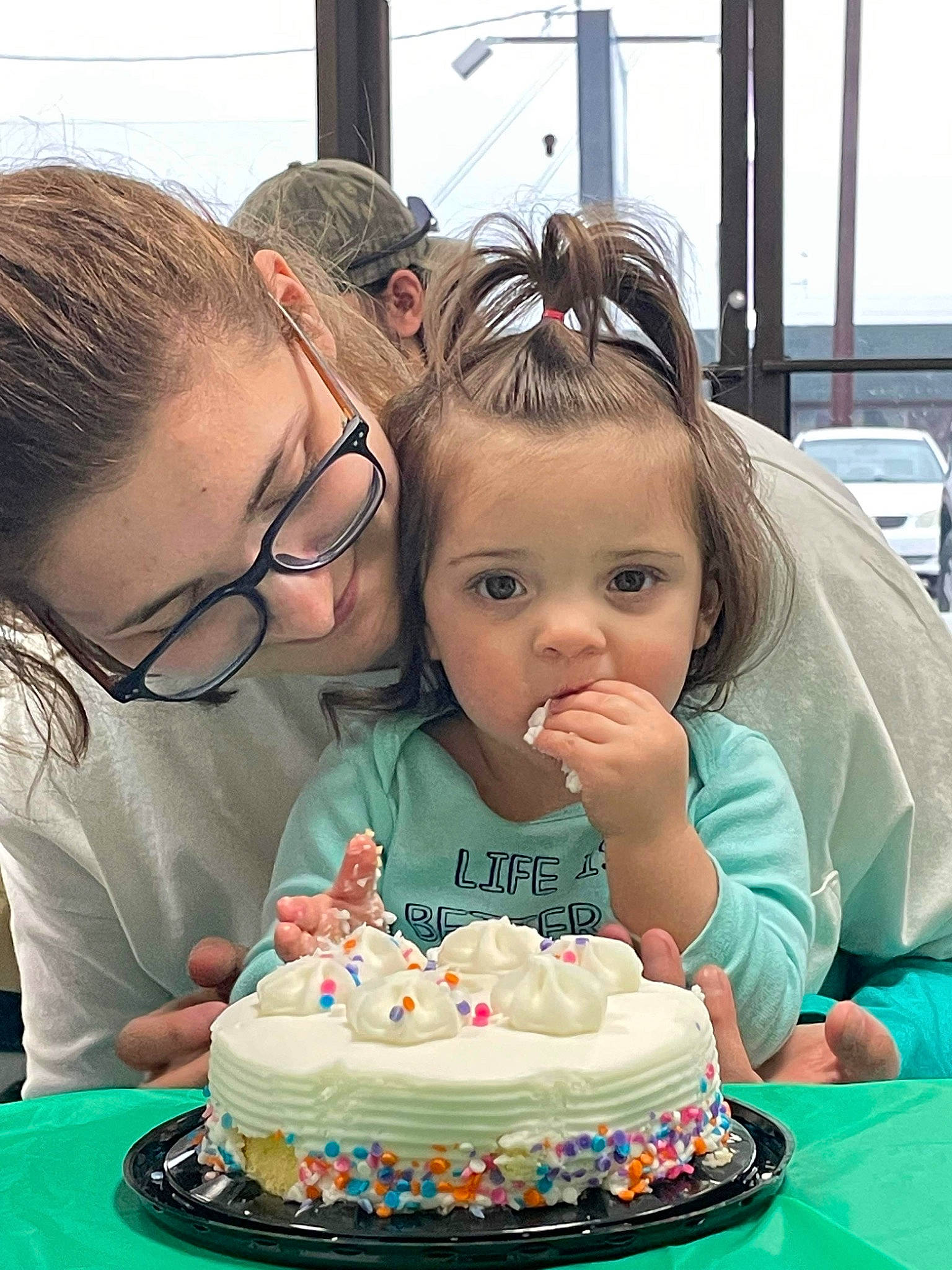 Everleigh is registered to the contest to win money with this photo: birthday, birthday_cake, cake, cake_decorating, cake_decorating_supply, cuisine, dessert, event, eyewear, food, fun, green, happy, person, plate, sharing, sugar_cake, sweetness, table, tableware