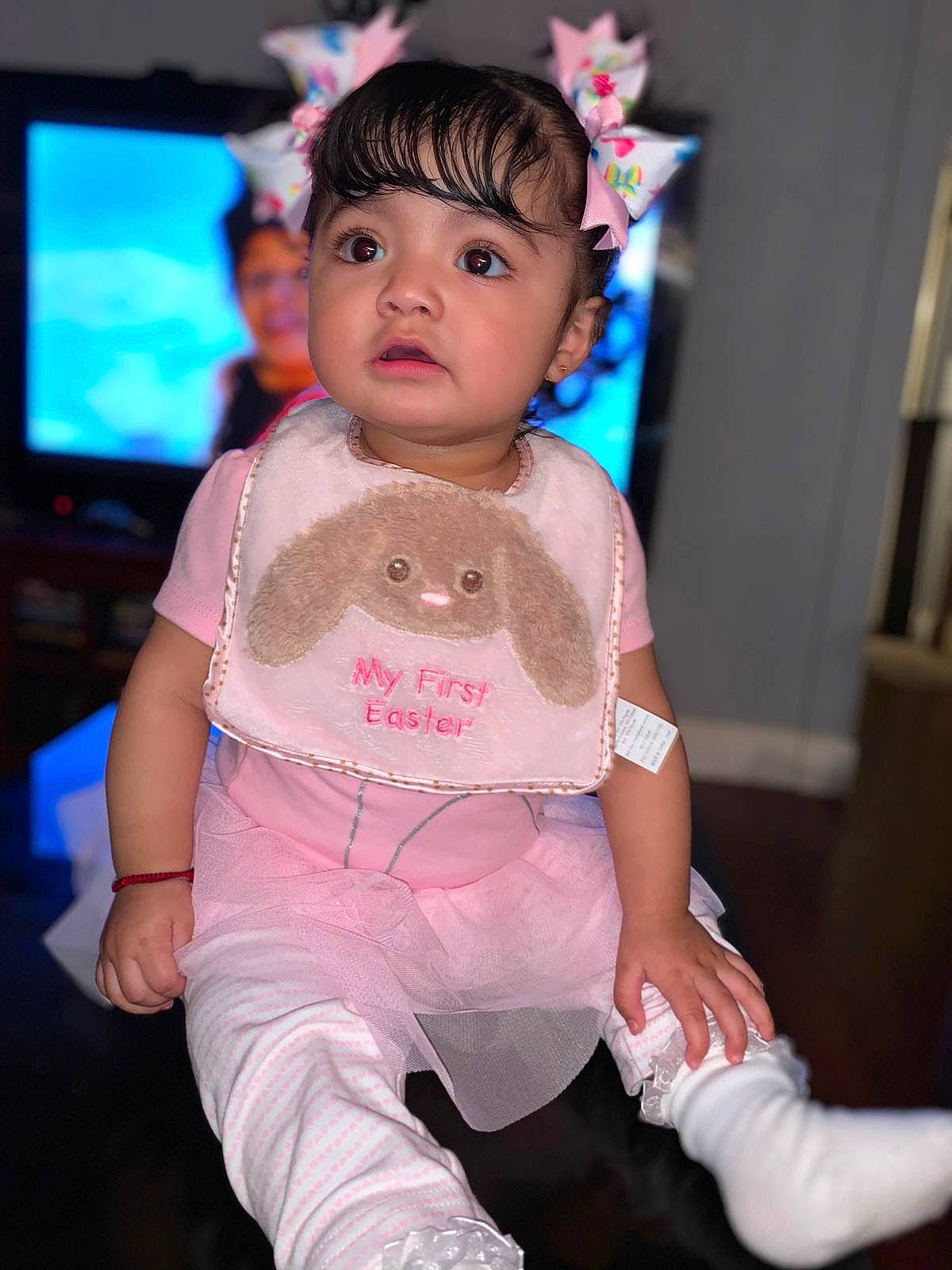 Alyssa is registered to the contest to win money with this photo: baby, baby_toddler_clothing, birthday, child, cool, display_device, event, eyelash, fashion_accessory, finger, fun, hairstyle, happy, jewellery, necklace, person, pink, skin, sleeve, television