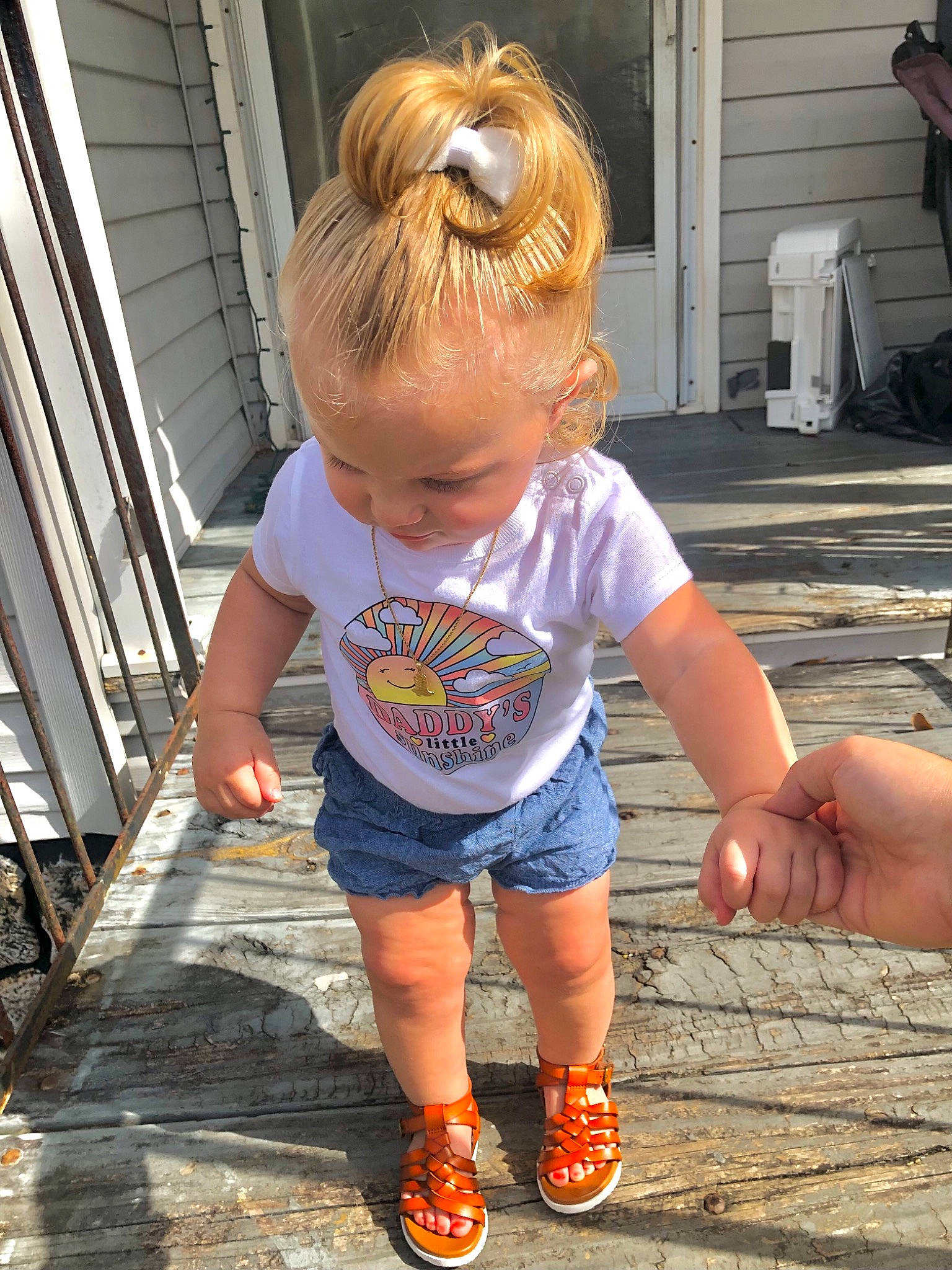 Carleigh is registered to the contest to win money with this photo: baby_toddler_clothing, child, eyewear, flooring, foot, fun, grass, hairstyle, happy, human_leg, leisure, person, sandal, sitting, summer, sunglasses, t_shirt, thigh, toddler, vertebrate