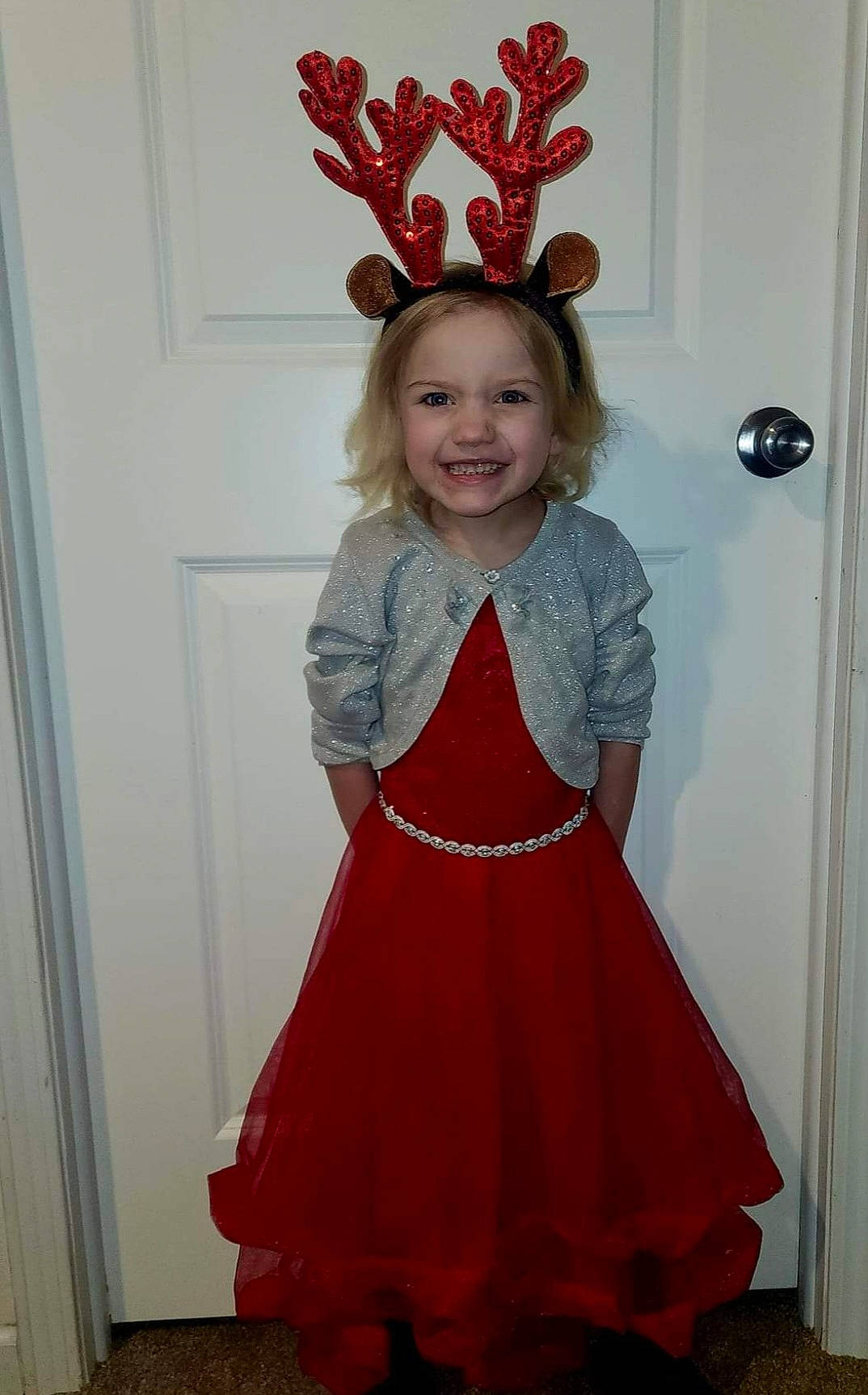 Ava is registered to the contest to win money with this photo: baby_toddler_clothing, day_dress, dress, embellishment, event, fashion_design, formal_wear, fun, hairstyle, happy, headgear, headpiece, joy, magenta, one_piece_garment, person, pink, red, sleeve, smile