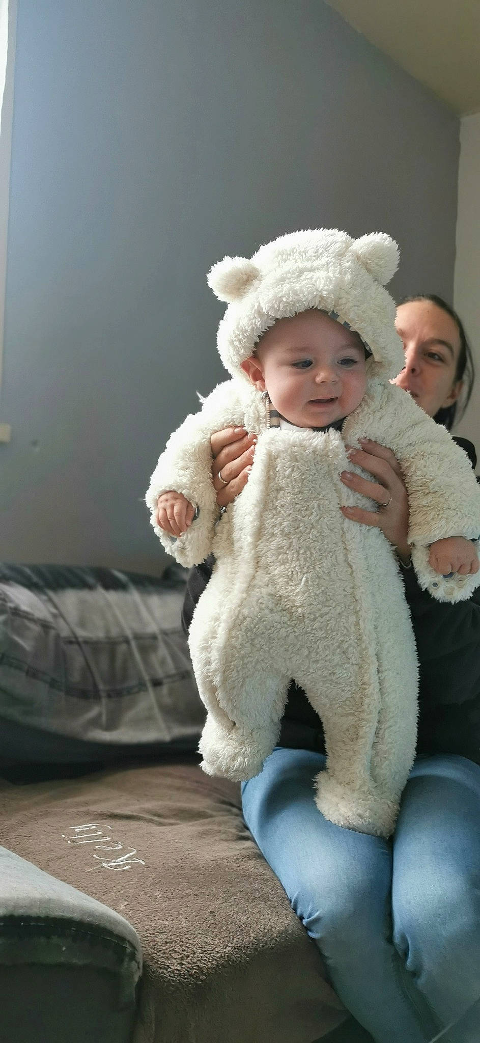 Malo a rejoint le concours — aidez-le/la à gagner de superbes lots ! baby, baby_toddler_clothing, cap, cheek, child, comfort, ear, fur, gesture, happy, hat, headwear, human_body, outerwear, person, sitting, skin, sleeve, stuffed_toy, textile