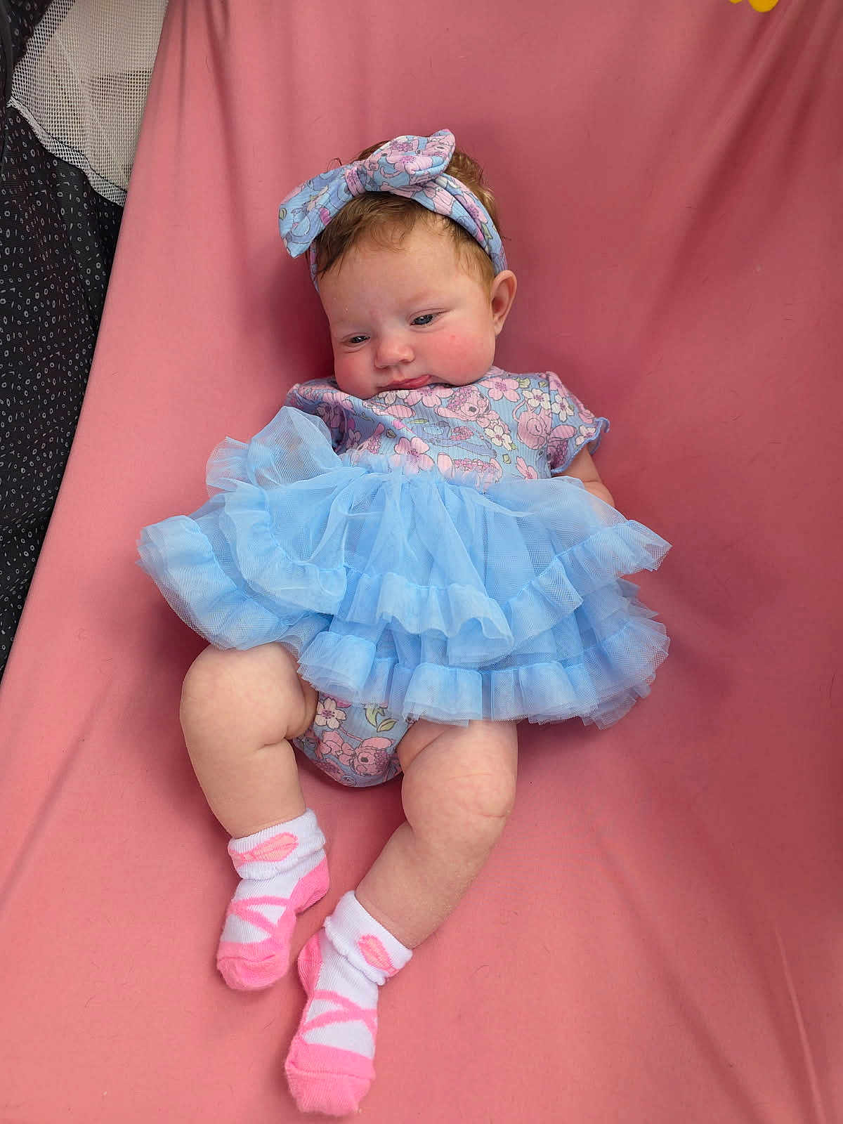 Freya joined the competition — help win amazing prizes! baby, infant, child, tutu, headband, blue, pink, socks, ballet_style, onesie, cute, soft, fabric, portrait, indoor, young_child, clothing, legs, feet, resting