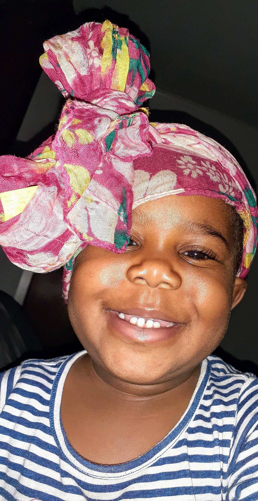 Ava is registered to the contest to win money with this photo: cheek, child, face, fashion_accessory, forehead, fun, hair_accessory, happy, head, headgear, joy, lip, nose, person, pink, skin, smile