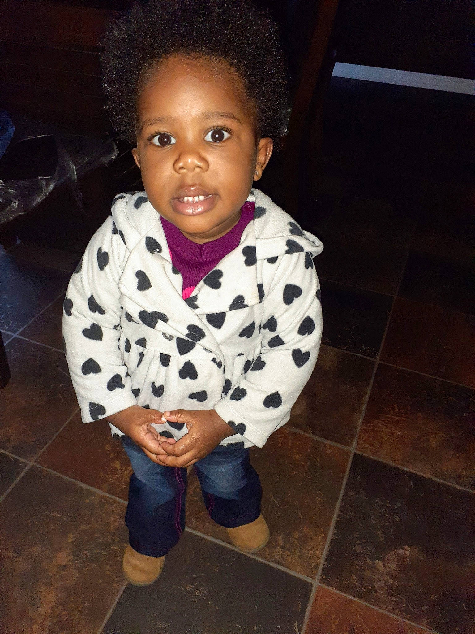 Ava joined the competition — help win amazing prizes! black_hair, cheek, child, cool, face, head, outerwear, person, smile, standing, toddler