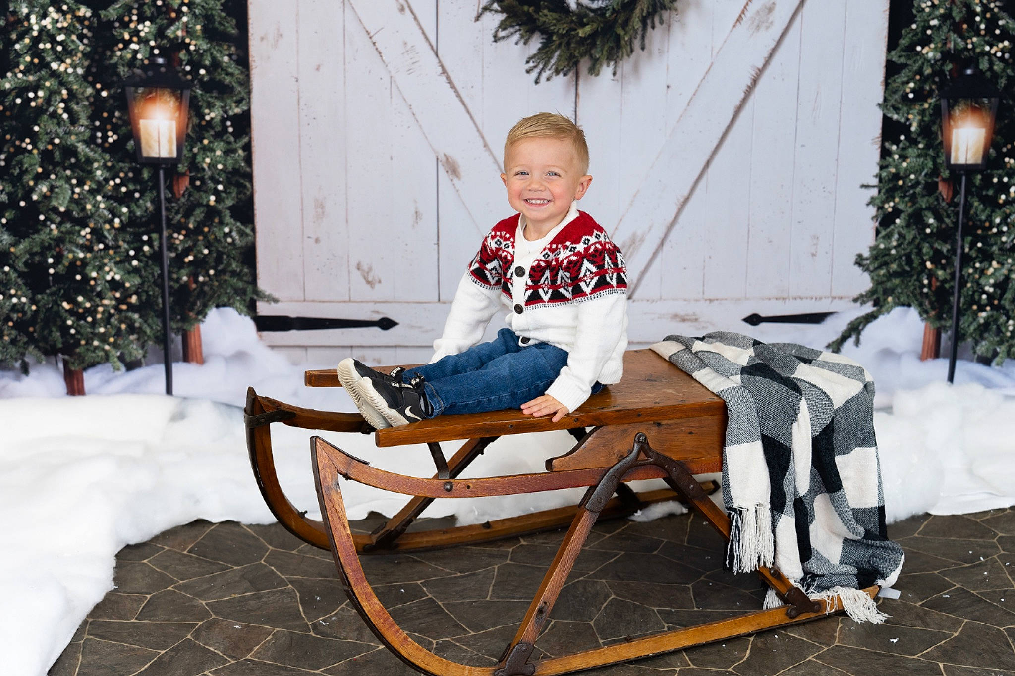 Colton joined the competition — help win amazing prizes! christmas, christmas_decoration, christmas_eve, christmas_ornament, christmas_tree, event, fun, happy, holiday, home, joy, lap, leisure, person, sitting, smile, snow, toddler, tree, wheel