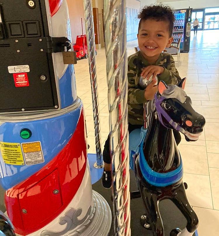 Logan joined the competition — help win amazing prizes! automotive_design, automotive_lighting, bridle, bumper, carousel, electric_blue, engineering, fictional_character, fun, gas, horse, horse_supplies, horse_tack, joy, leisure, machine, motor_vehicle, person, personal_protective_equipment, recreation