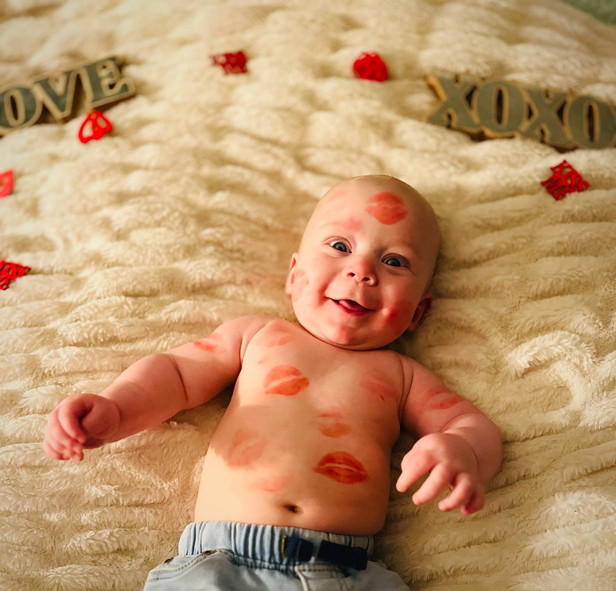 Brantley joined the competition — help win amazing prizes! baby, baby_toddler_clothing, chest, child, comfort, face, facial_expression, flooring, gesture, happy, people_in_nature, person, product, red, skin, smile, stomach, textile, toddler, white
