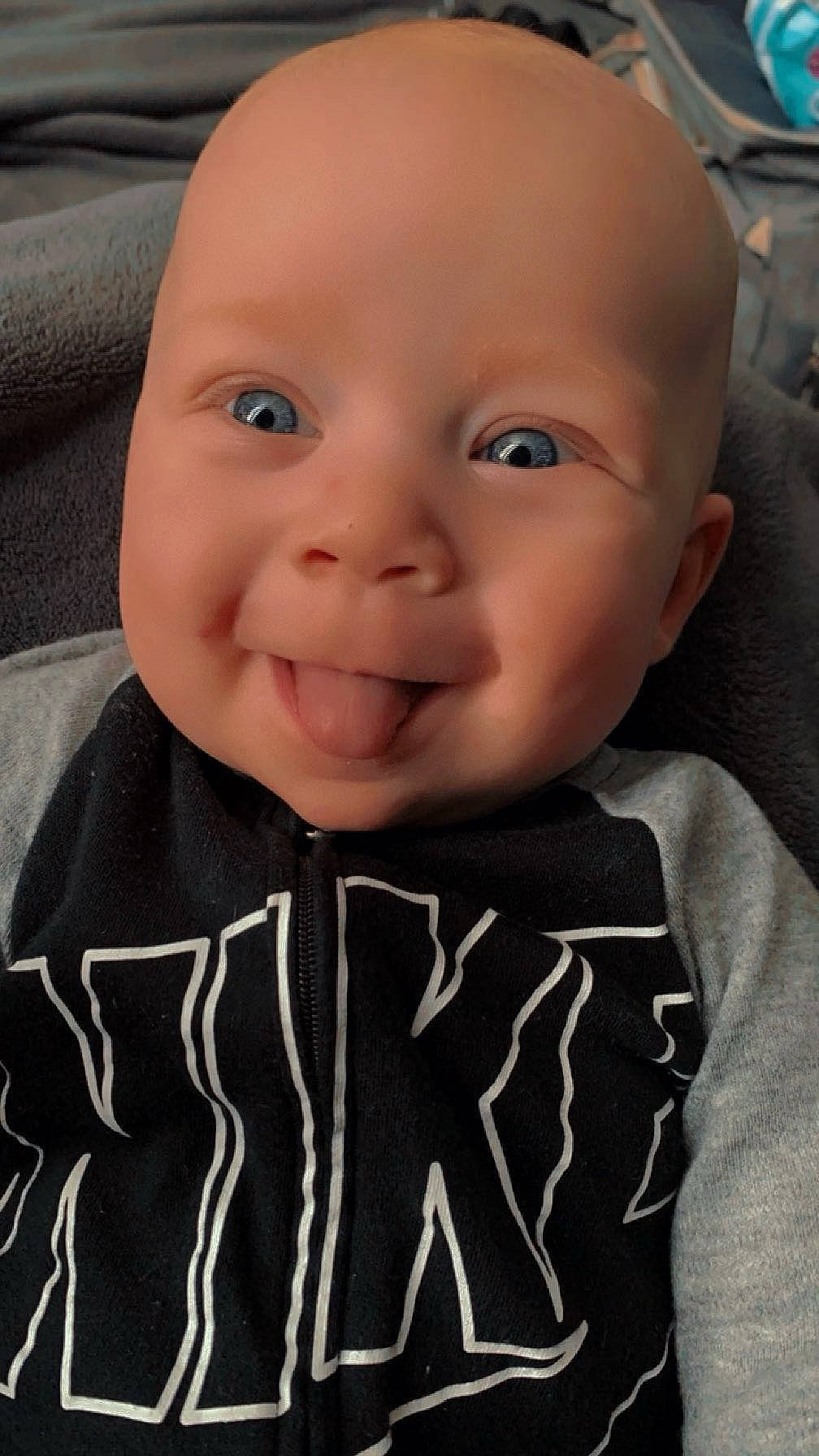 Brantley joined the competition — help win amazing prizes! baby_toddler_clothing, cheek, chin, eye, eyebrow, face, facial_expression, grey, hairstyle, head, iris, lip, mammal, nose, person, product, skin, sleeve, smile, standing