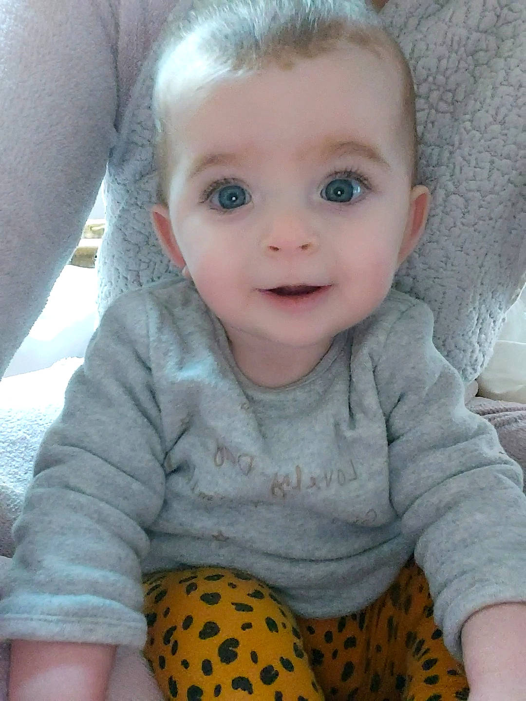 Amalya participe au concours pour gagner de l'argent avec cette photo : arm, baby_toddler_clothing, cheek, chin, eye, eyebrow, facial_expression, hair, head, human_body, lip, neck, nose, organ, outerwear, person, product, skin, sleeve, smile