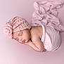 Amalyah a rejoint le concours — aidez-le/la à gagner de superbes lots ! baby, newborn, sleeping, pink, blanket, hat, portrait, soft, cozy, infant, child, cute, peaceful, resting, wrapped, knit, rossette, pastel, closeup, studio