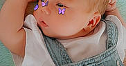 Nova Bowling joined the competition — help win amazing prizes! baby, infant, denim_overalls, white_shirt, heart_patch, butterfly_stickers, face, cheeks, blanket, colorful, fuzzy, cute, lying_down, child, young, skin, head, arm, expression, indoors