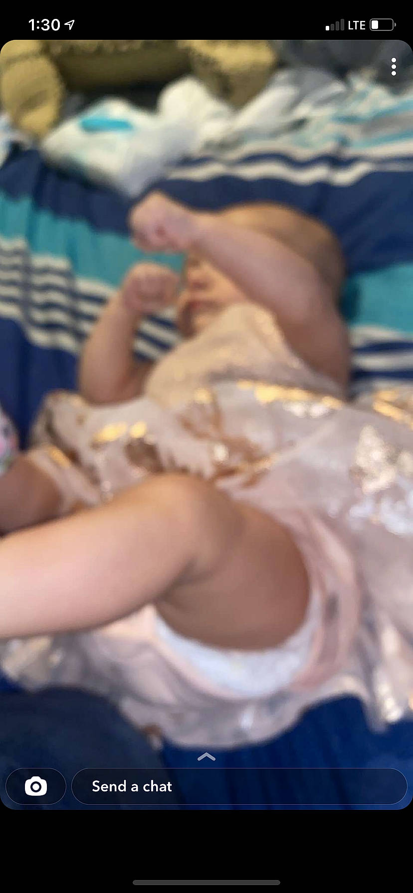 Serenity is registered to the contest to win money with this photo: abdomen, child, comfort, elbow, event, finger, flesh, foot, fun, gesture, human_leg, knee, lap, linens, nail, person, sitting, thigh, thumb, toddler