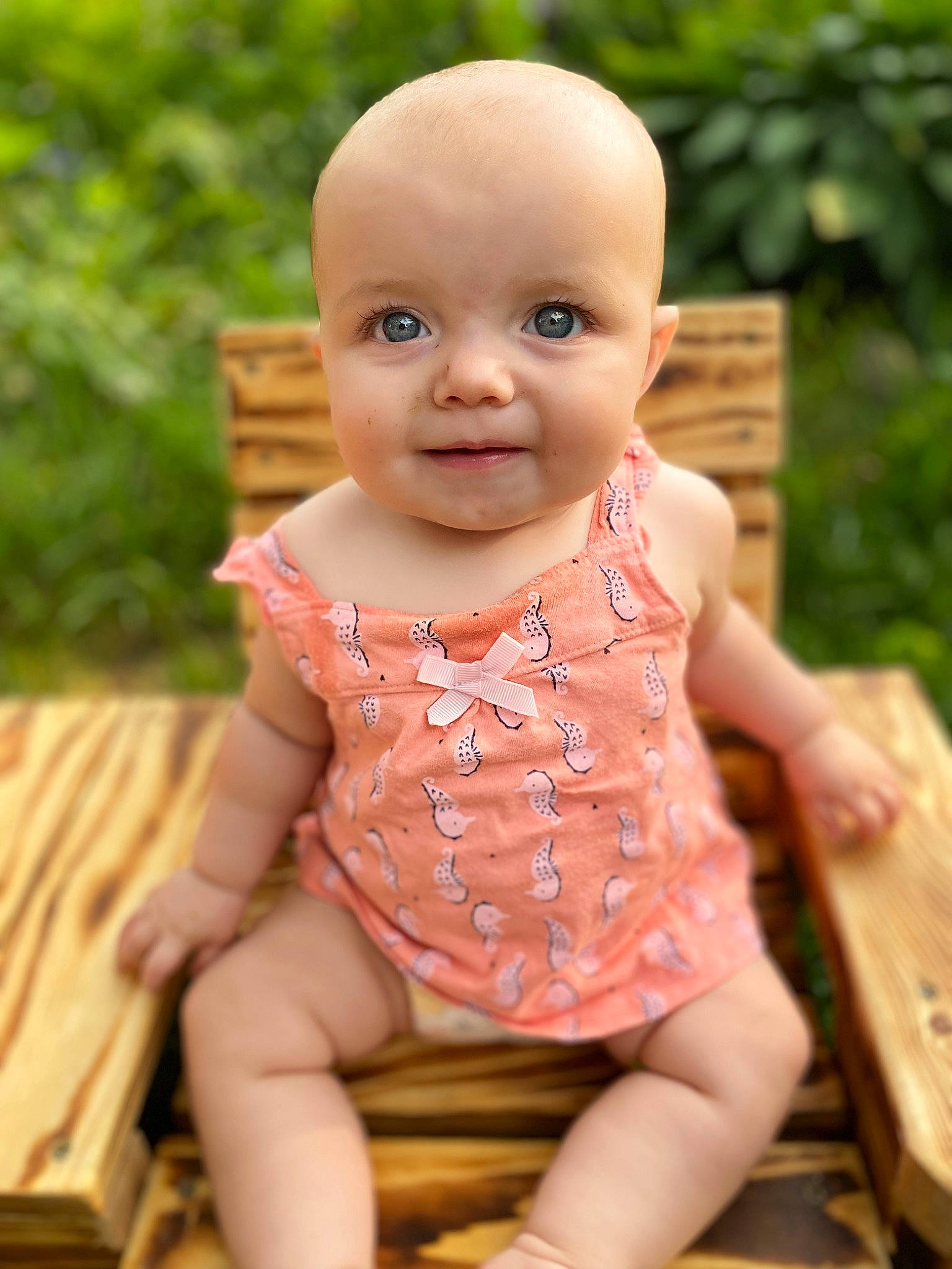 Huntley is registered to the contest to win money with this photo: baby, baby_toddler_clothing, cheek, child, chin, eye, fun, grass, happy, iris, leisure, lip, nose, pattern, people_in_nature, person, sitting, skin, smile, toddler