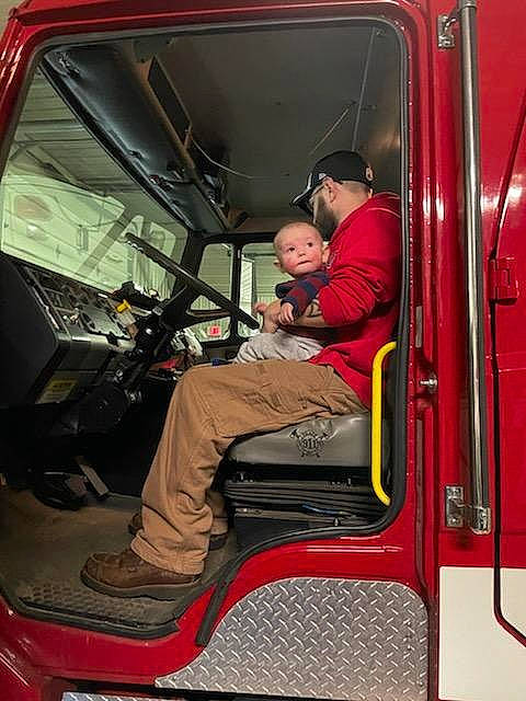 Devon is registered to the contest to win money with this photo: auto_part, automotive_design, automotive_exterior, automotive_lighting, automotive_tire, automotive_wheel_system, bumper, emergency_service, hat, helmet, hood, mode_of_transport, motor_vehicle, person, personal_protective_equipment, service, truck, truck_driver, vehicle, vehicle_door