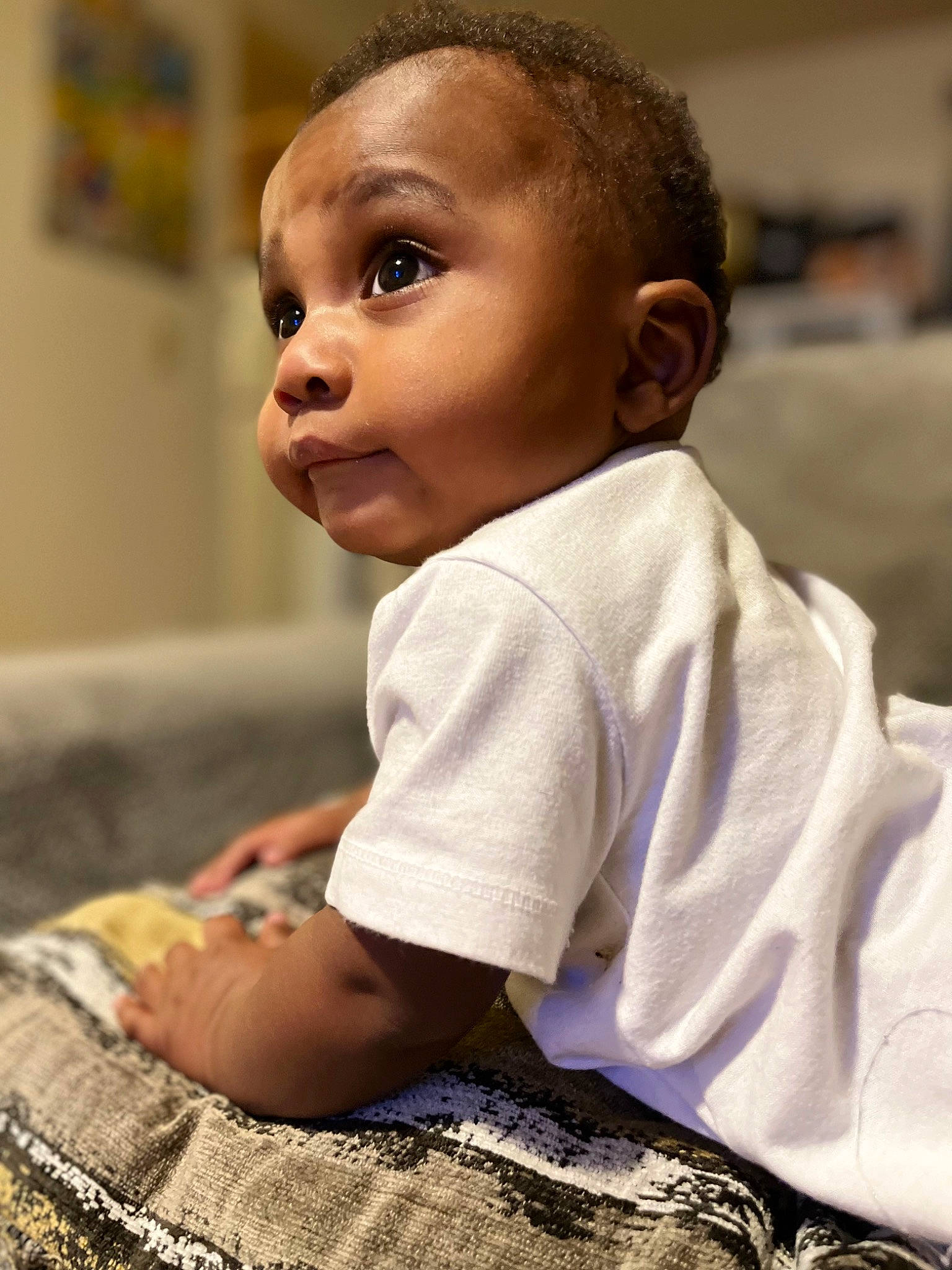 Messiah joined the competition — help win amazing prizes! baby, baby_toddler_clothing, cheek, child, comfort, eyelash, flooring, fun, happy, iris, linens, nose, person, portrait_photography, room, sitting, skin, sleeve, smile, t_shirt