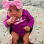 Michelle is registered to the contest to win money with this photo: accessories, baby, bed, bedroom, bodypart, clothing, couch, cushion, face, finger, furniture, hand, hat, head, homedecor, indoors, person, photography, portrait, room