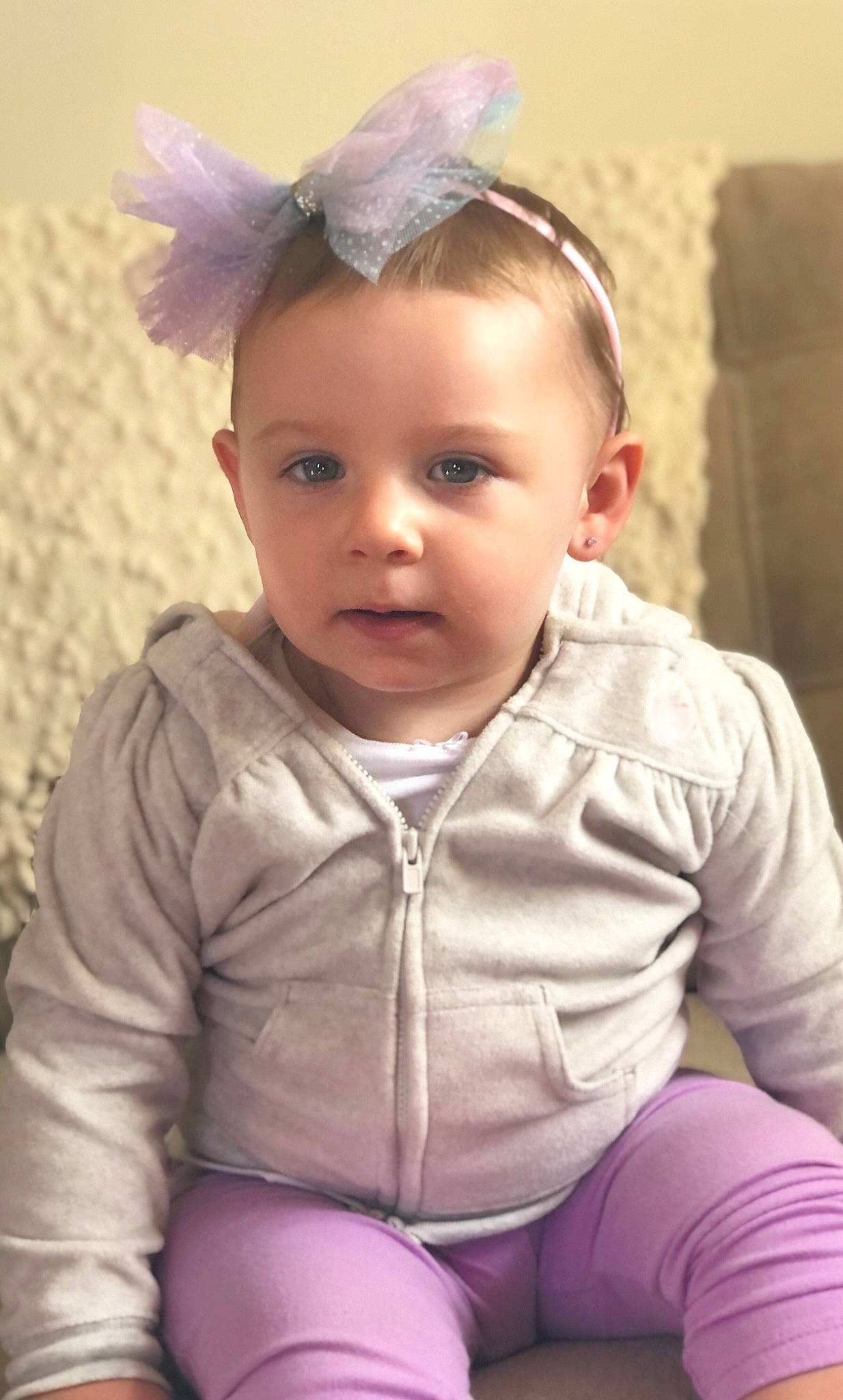 Adalaya is registered to the contest to win money with this photo: arm, baby_toddler_clothing, cheek, clothing, dress, eye, eyelash, grass, hairstyle, happy, head, headgear, helmet, human_body, iris, lip, person, pink, skin, sleeve