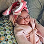 Ariya joined the competition — help win amazing prizes! baby, child, towel, bathrobe, pillow, pattern, face, headwear, indoor, cute, infant, soft, comfort, relaxing, expression, portrait, person, smile, skin, cozy
