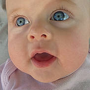 Madalynn is registered to the contest to win money with this photo: baby, face, blue_eyes, chubby_cheeks, pink_shirt, infant, close_up, curious, drool, mouth_open, skin, eyelashes, nose, head, person, child, cute, expression, apparel, text_on_clothing