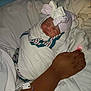 Celeste joined the competition — help win amazing prizes! newborn, baby, hospital, blanket, hat, bow, sleeping, swaddled, infant, hand, pulse_oximeter, medical, bed, white, cozy, patient, healthcare, resting, closeup, wrapped