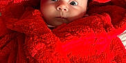 Malahni is registered to the contest to win money with this photo: baby, child, red_robe, fluffy, wrapped, wide_eyes, face, skin, soft_texture, indoor, portrait, cute, warm, blanket, expression, young, infant, cozy, clothing, closeup