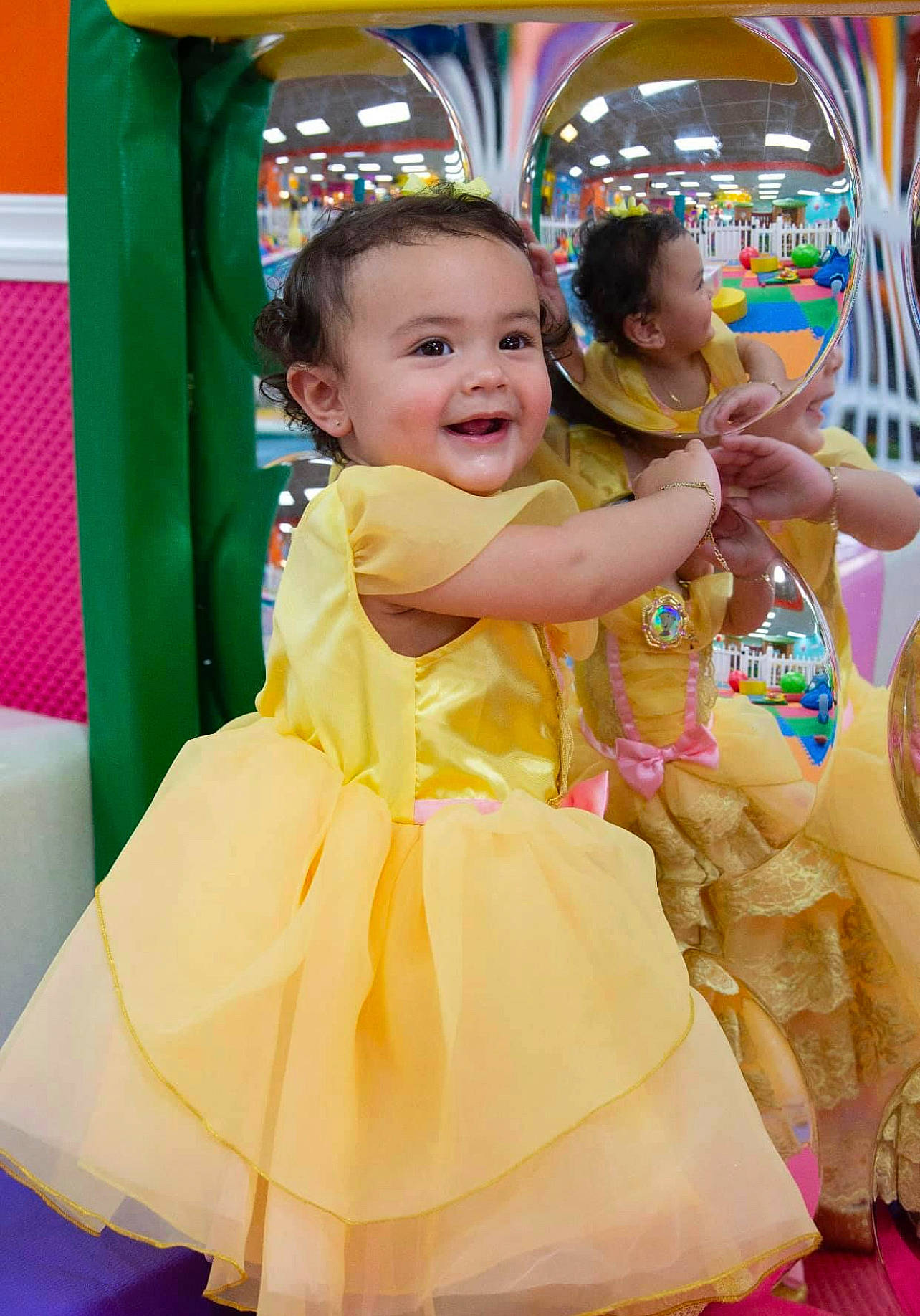 Ainhoa joined the competition — help win amazing prizes! baby, baby_toddler_clothing, child, chute, costume, dress, event, fun, green, happy, joy, leisure, magenta, peach, person, pink, play, recreation, skin, smile