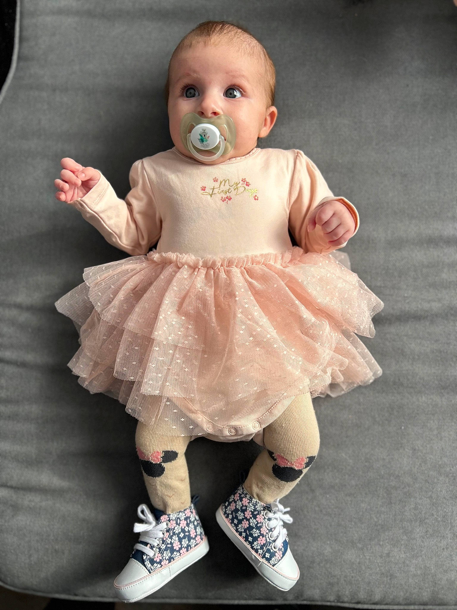 Cataleya participe au concours pour gagner de l'argent avec cette photo : baby, baby_toddler_clothing, cheek, child, day_dress, dress, embellishment, flash_photography, happy, human_body, iris, one_piece_garment, pattern, peach, person, pink, ruffle, sitting, skin, sleeve