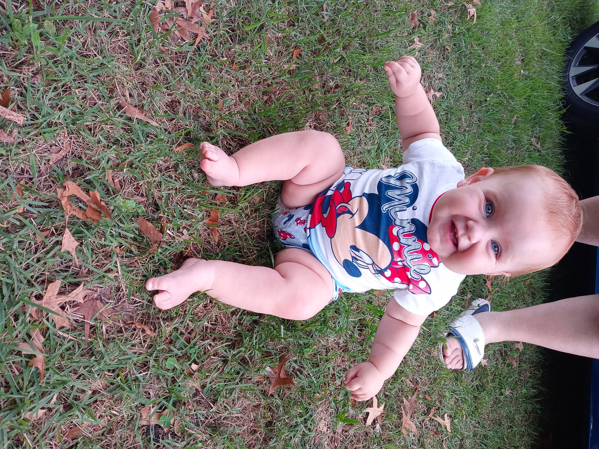 Maddison joined the competition — help win amazing prizes! arm, baby, baby_toddler_clothing, dress, eye, face, finger, grass, hand, happy, human_body, leaf, leg, people_in_nature, person, plant, smile, tire, toddler, tree