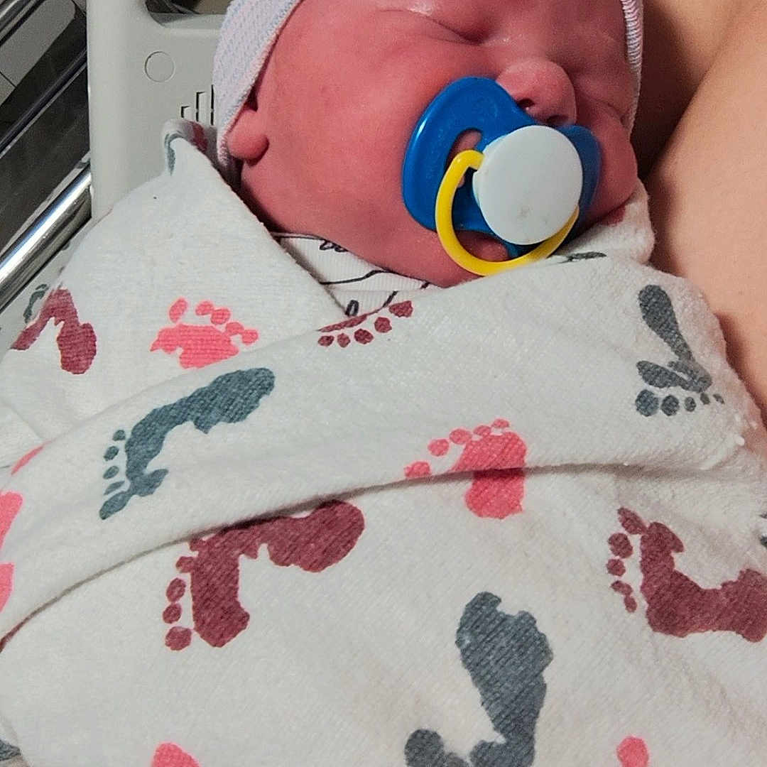 Nathaniel is registered to the contest to win money with this photo: architecture, baby, bed, blanket, building, clothing, cushion, face, furniture, glove, hat, head, homedecor, hospital, newborn, person, photography, portrait, quilt, sleeping