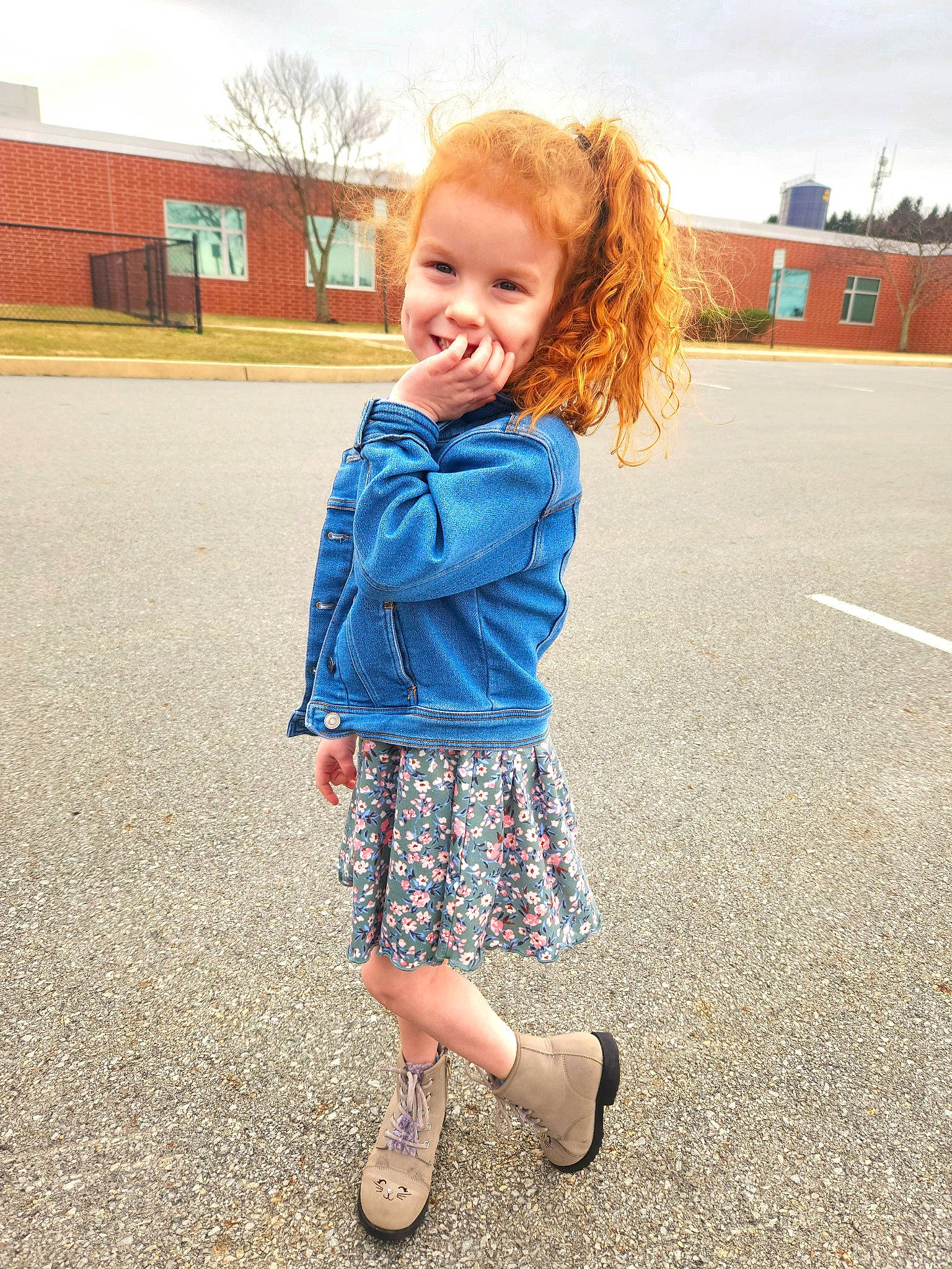 Maelee is registered to the contest to win money with this photo: baby_toddler_clothing, child, cloud, denim, electric_blue, face, fun, grass, happy, head, joy, leisure, pattern, people_in_nature, person, sky, sleeve, smile, standing, summer