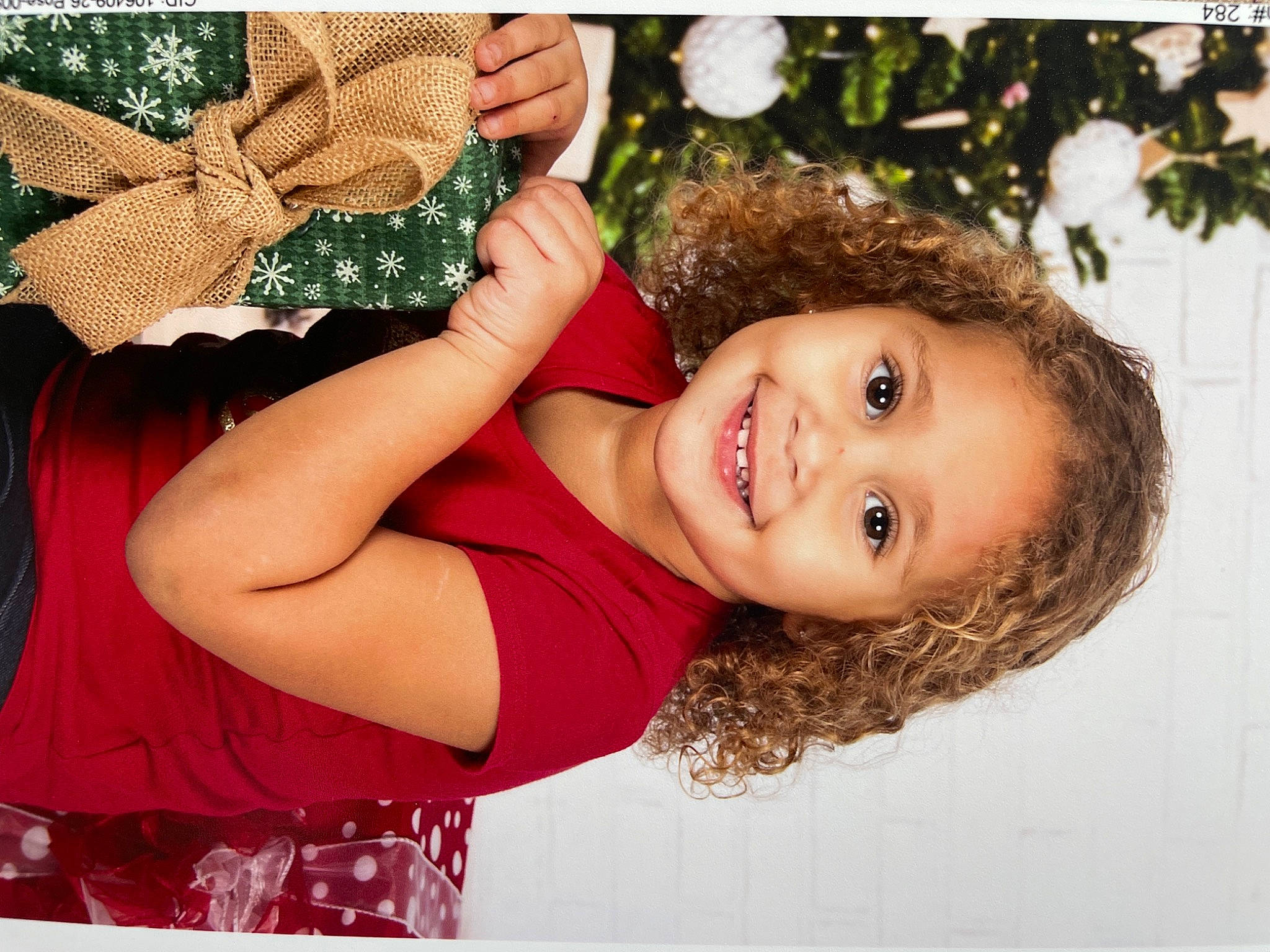 Julianna is registered to the contest to win money with this photo: arm, beauty, black_hair, child, face, fawn, flash_photography, fun, gesture, grass, hairstyle, hand, happy, joy, lip, people_in_nature, person, skin, smile, tree