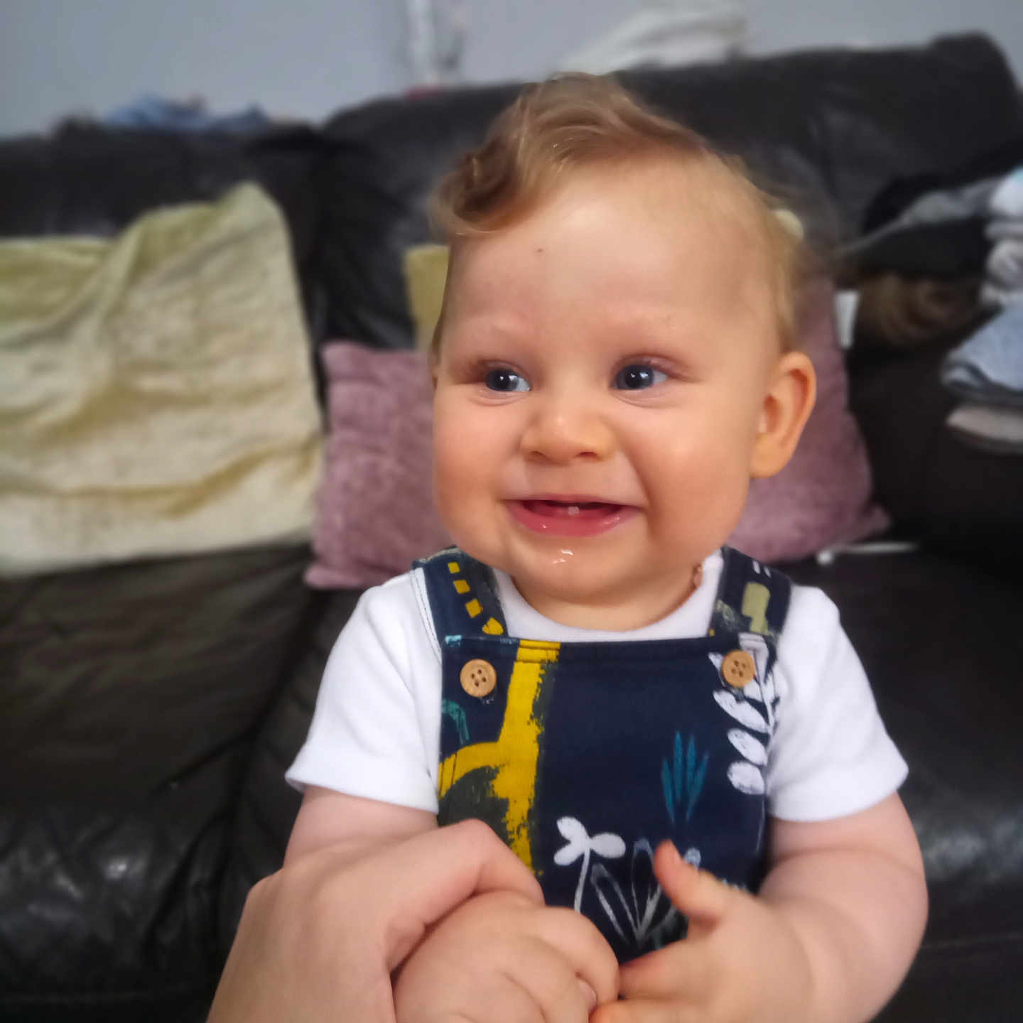 Luka Nova is registered to the contest to win money with this photo: architecture, baby, bodypart, building, couch, cushion, face, finger, furniture, hand, happy, head, homedecor, indoors, livingroom, person, photography, portrait, room, smile