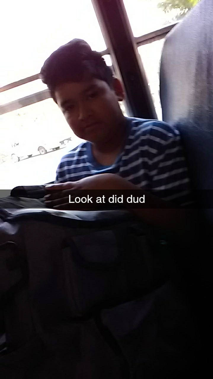 James is registered to the contest to win money with this photo: black_hair, cool, passenger, person, photography, shoulder, sitting, snapshot