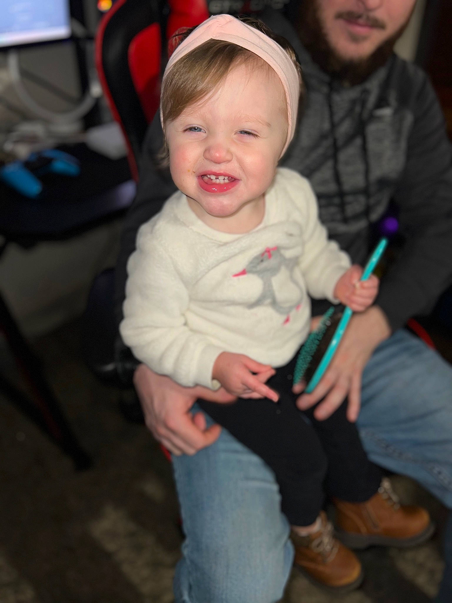 Kyla is registered to the contest to win money with this photo: baby, baby_toddler_clothing, cap, chair, cheek, child, clothing, event, fun, happy, hat, iris, jeans, joy, lap, person, sitting, skin, smile, standing