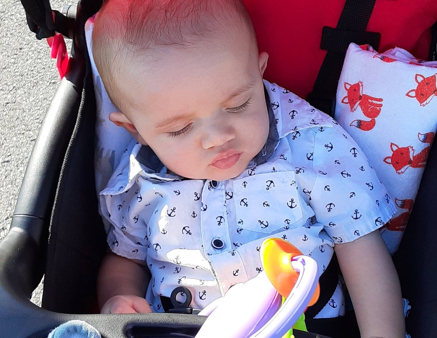 Sunni is registered to the contest to win money with this photo: baby, baby_toddler_clothing, cheek, facial_expression, finger, human_body, iris, lip, mouth, nose, orange, organ, person, photograph, product, skin, sleeve, textile, toddler, white