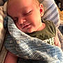 baby, bed, blanket, clothing, couch, cushion, face, furniture, glove, head, homedecor, linen, newborn, person, photography, portrait, quilt, sleeping, t_shirt, towel