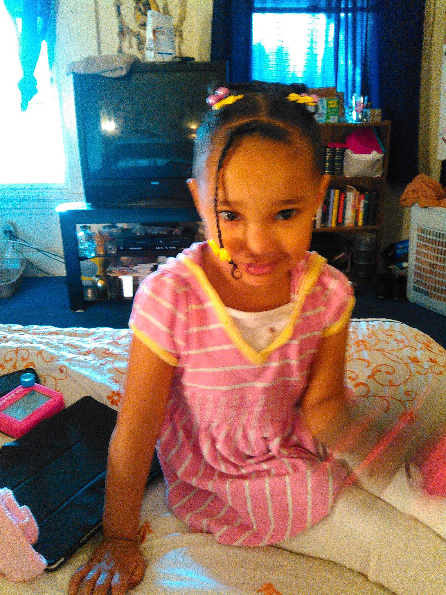 Honesty is registered to the contest to win money with this photo: audio_equipment, chair, child, curtain, event, flooring, fun, human_leg, joy, lap, leisure, person, picture_frame, room, sitting, smile, summer, t_shirt, television, television_set