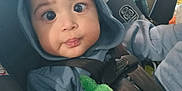 Jaxton joined the competition — help win amazing prizes! baby, child, car_seat, hoodie, plush_toy, seatbelt, indoor, cute, infant, clothing, person, closeup, sitting, expression, hand, soft_toy, safety, car_interior, young_child, portrait