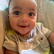 Jaxton is registered to the contest to win money with this photo: baby, smiling, infant, child, face, cute, clothing, sitting, portrait, happy, indoors, young, person, seat, pattern, fabric, head, eyes, skin, toddler