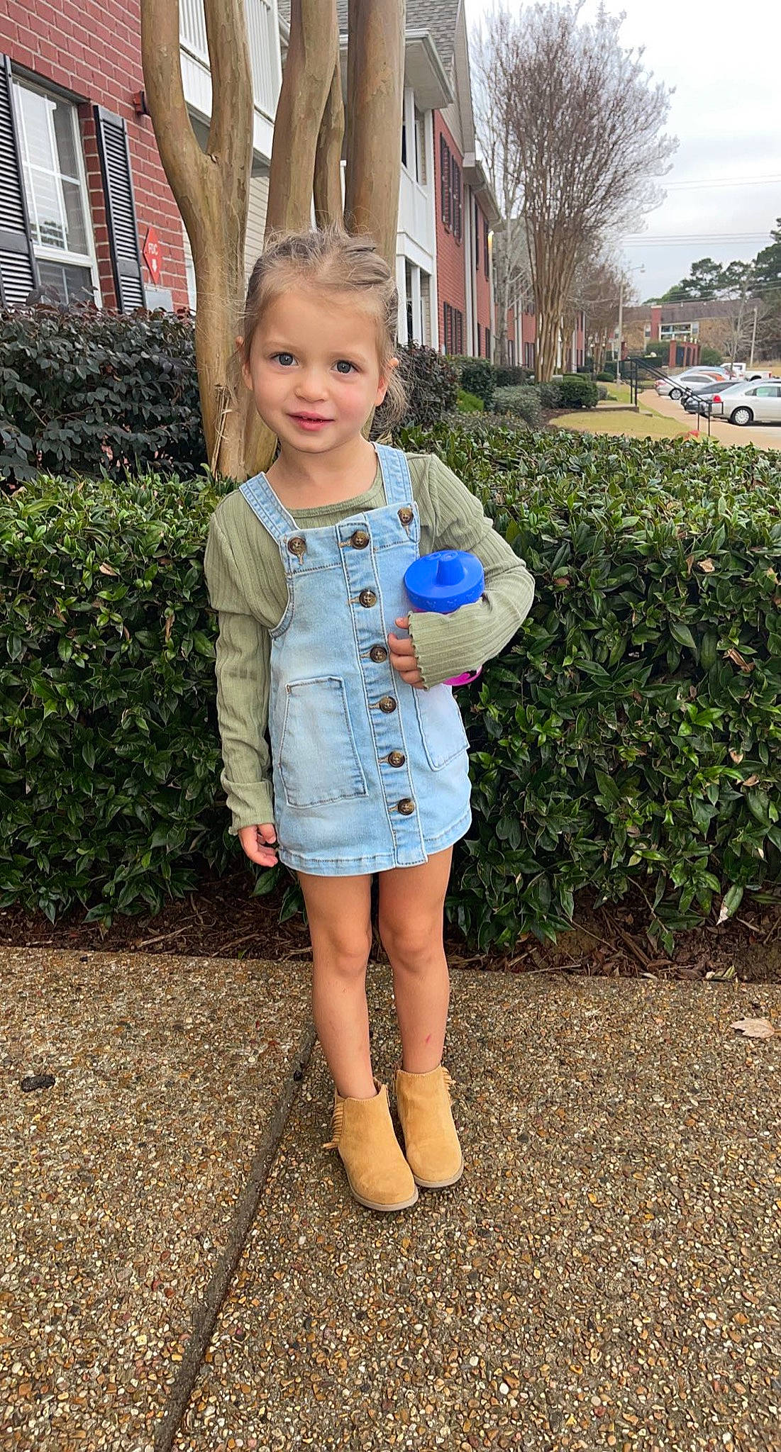 Jersey is registered to the contest to win money with this photo: blond, boot, child, denim, electric_blue, fun, grass, grass_family, human_leg, joy, leg, leisure, pattern, person, plant, recreation, sleeve, sneakers, street_fashion, toddler