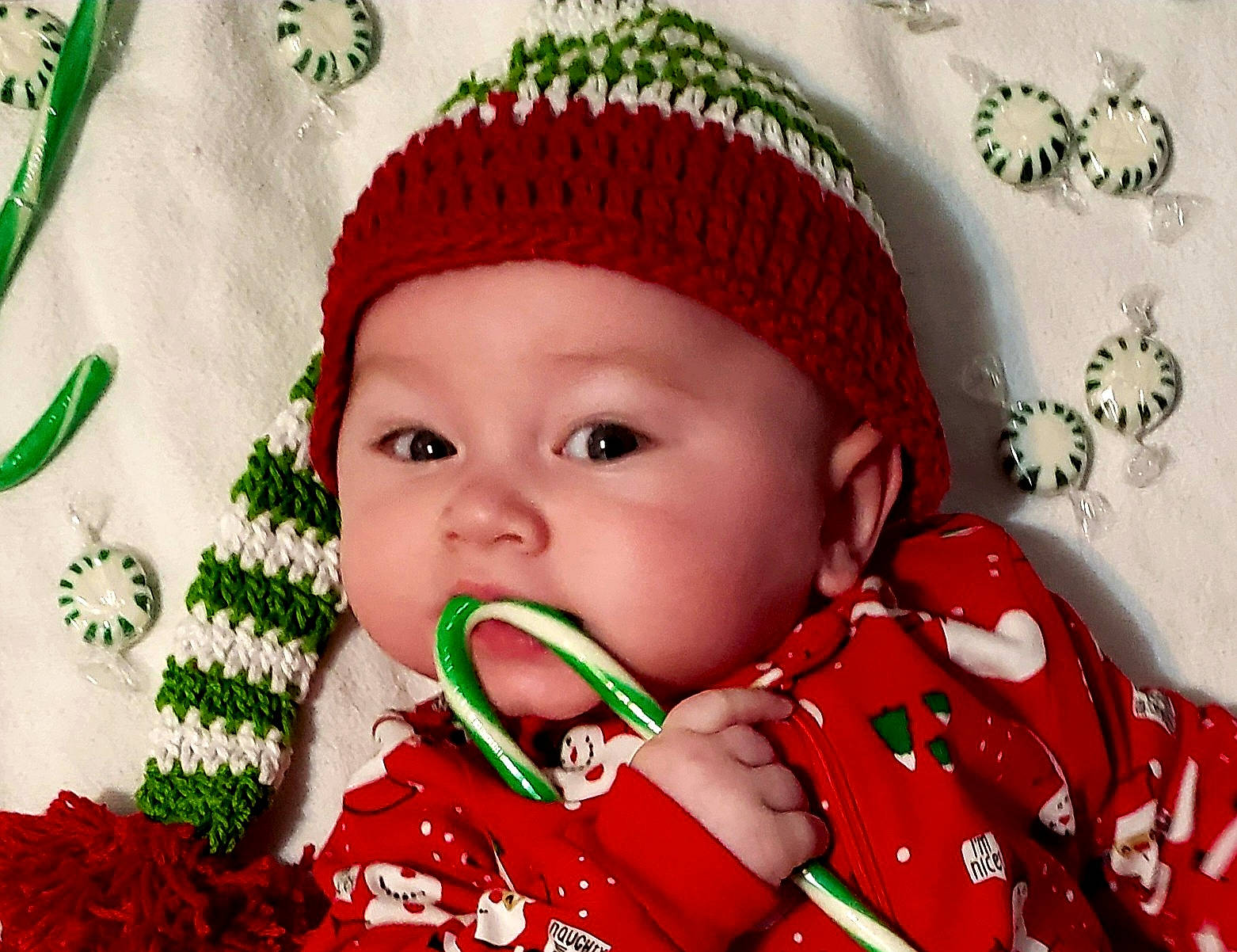 Anderson joined the competition — help win amazing prizes! baby, baby_toddler_clothing, cap, cheek, child, creative_arts, eye, face, facial_expression, green, happy, head, headwear, holiday, lip, organ, person, product, red, textile