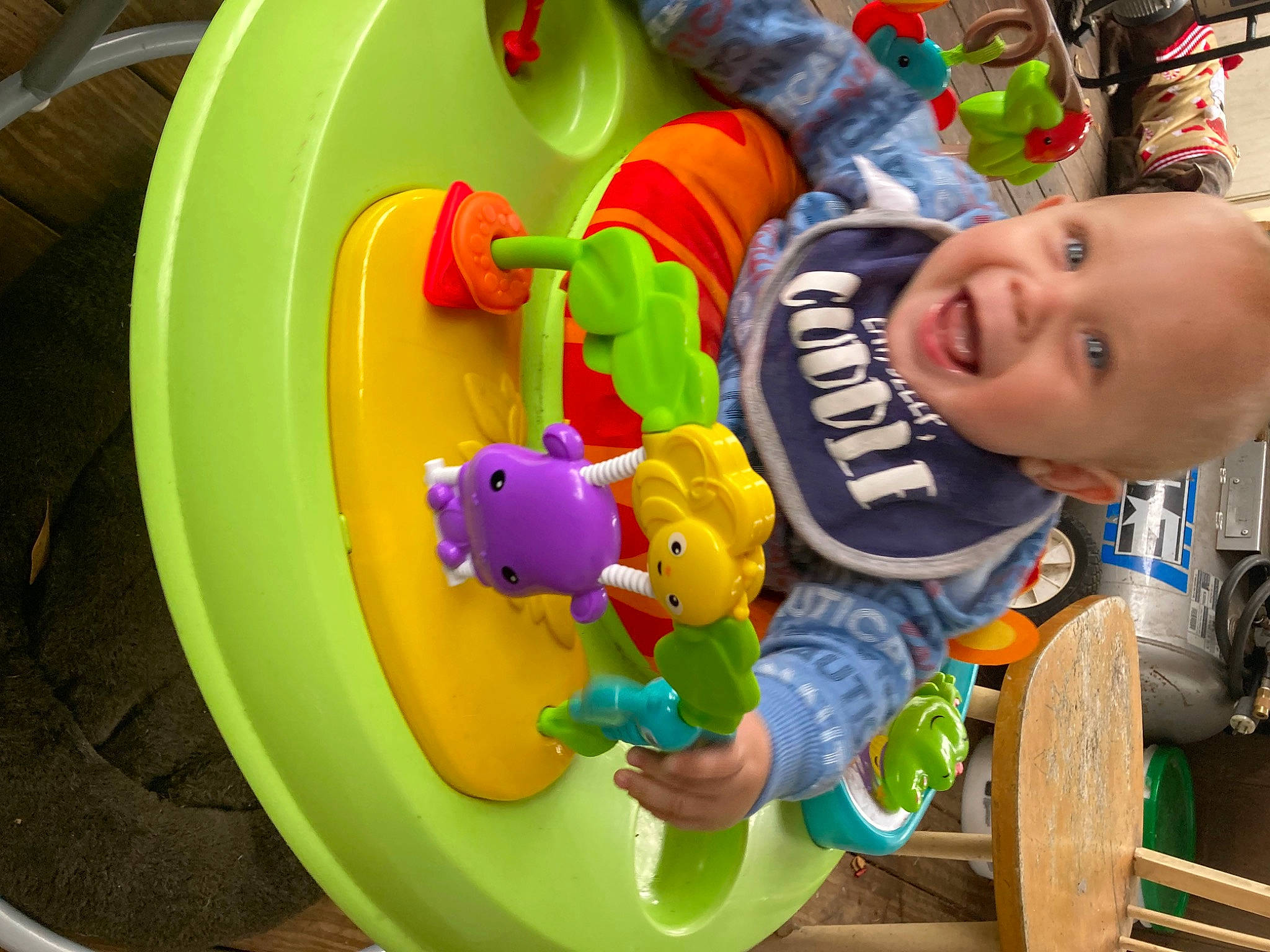 Josiah joined the competition — help win amazing prizes! baby, baby_playing_with_toys, baby_products, baby_toddler_clothing, baby_toys, child, circle, city, fun, green, happy, leisure, outdoor_play_equipment, person, play, recreation, smile, tire, toddler, toy