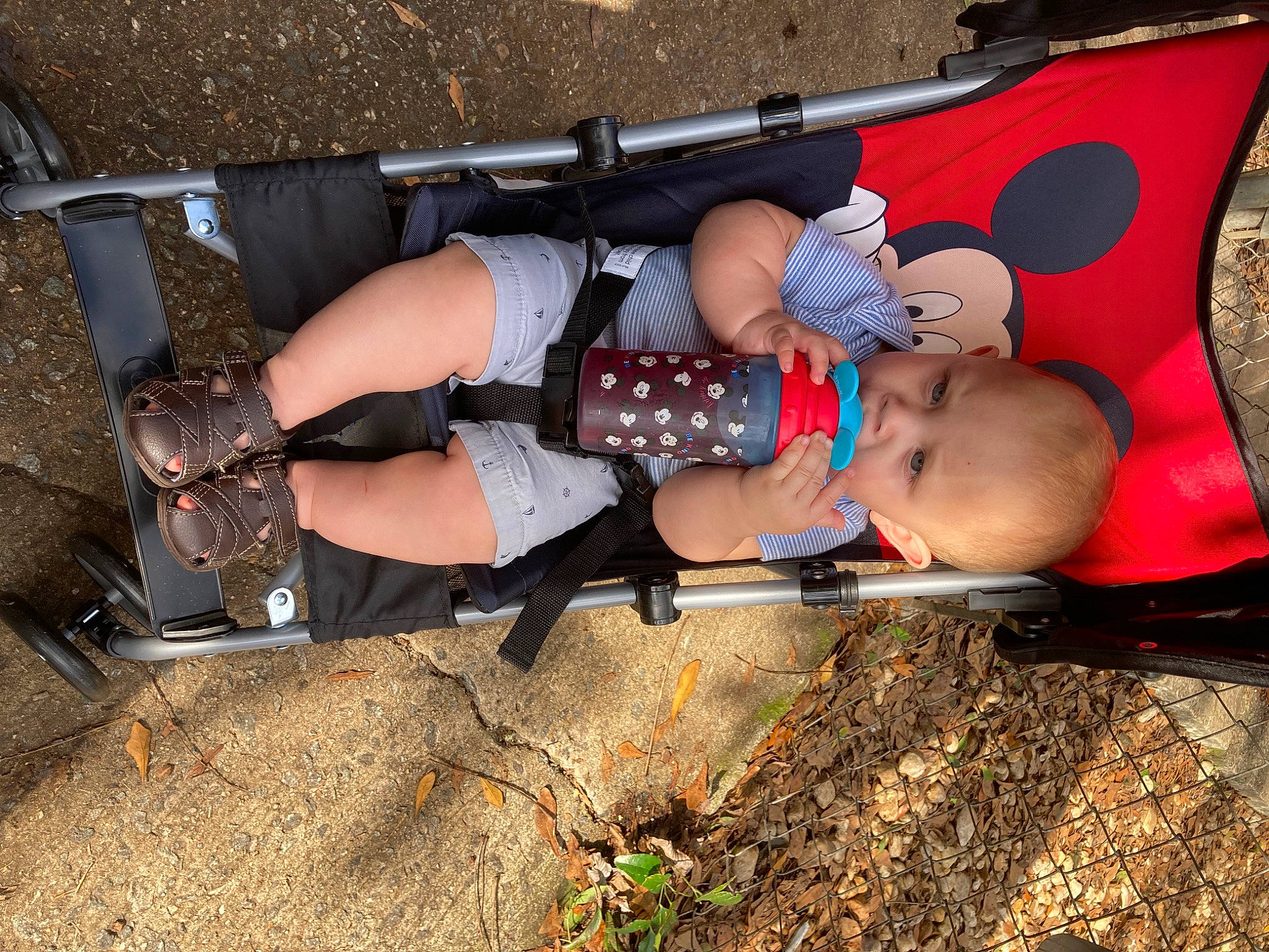 Josiah joined the competition — help win amazing prizes! baby, baby_products, baby_toddler_clothing, boot, child, foot, fun, hat, human_leg, knee, leg, leisure, person, personal_protective_equipment, recreation, shorts, sitting, smile, soil, thigh