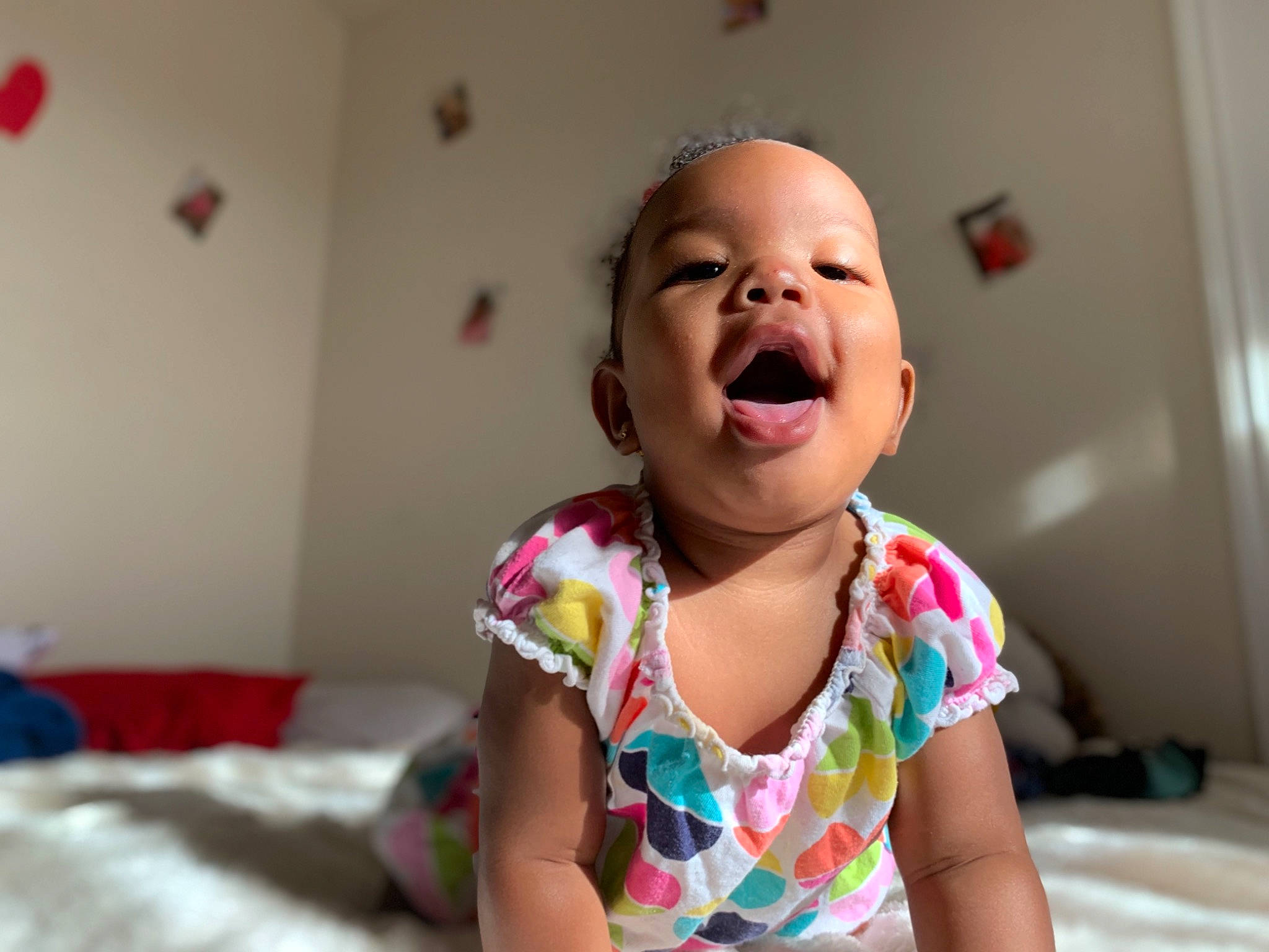 Khalia joined the competition — help win amazing prizes! arm, baby, cheek, child, face, facial_expression, fun, happy, head, laugh, lip, mouth, nose, person, pink, play, skin, smile, toddler, tongue